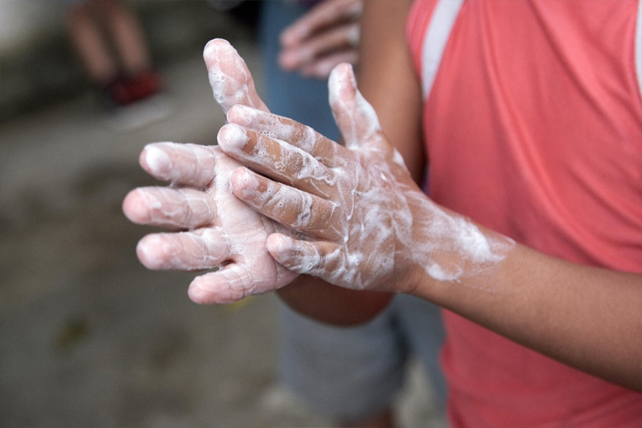 Wash your hands with water and soap